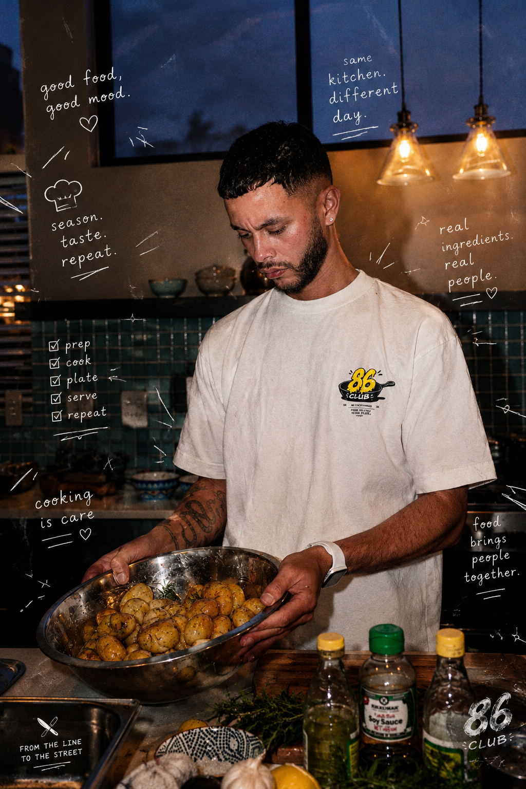 Chef in an 86 Club tee in a home kitchen at night